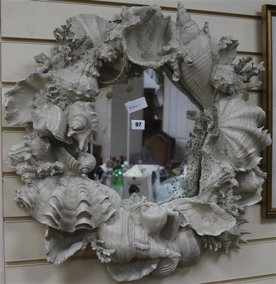 A shell frame mirror